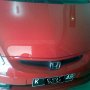 Jual Honda jazz A/T merah tahun 2006