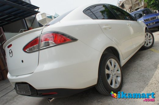 Jual Mazda 2 Sedan Putih  2011 TV GPS Mobil  Simpanan 