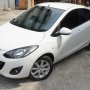 Jual Mazda 2 Sedan Putih 2011 + TV + GPS ( Mobil Simpanan )