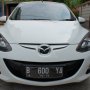 Jual Mazda 2 Sedan Putih 2011 + TV + GPS ( Mobil Simpanan )