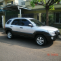 Jual Kia sportage ii suv 2005 silver metalik tgn 1 dari baru