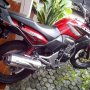 Jual honda tiger revo 2012 merah terawat (KM rendah + aksesoris + battlax)