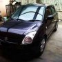 Suzuki Swift ST tahun 2010 hitam mulus