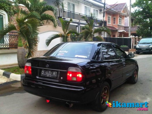 DIJUAL SUZUKI BALENO HITAM MANUAL 2002 DP RINGAN - Mobil