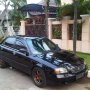 DIJUAL SUZUKI BALENO HITAM MANUAL 2002 DP RINGAN