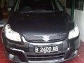 DIJUAL SUZUKI SX4 TAHUN 2008 HITAM METALIK KM 7145