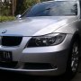 BMW 320i 2009 silver low km perfect condition