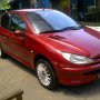 Jual peugeot 206 th. 2002 M/T merah metalik 