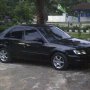 Jual Soluna xli 2002 MT Hitam depok