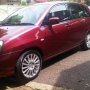 Suzuki aerio at merah maroon tahun 2003 tangan pertama