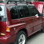 Dijual SUZUKI ESCUDO NOMADE 2001 Merah