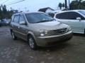 KIA CARRENS II 2004 COKLAT GOLD