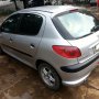 JUAL PEUGEOT 206 THN 2004 M/T SILVER 