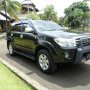 Jual Toyota Fortuner 2011 Hitam Metalik