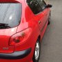 Jual peugeot 2005 merah