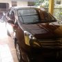 Jual grand livina 2013 Merah maroon