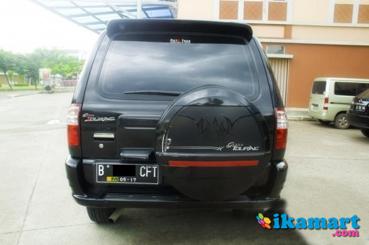 ISUZU PANTHER  GRAND  TOURING  HITAM 2012 Mobil 