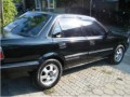 Toyota twin cam 1,6  1990 hitam,ac tape vr